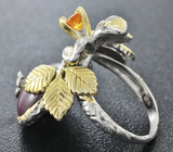 Серебряное кольцо со звездчатым и золотисто-желтым сапфиром Серебро 925