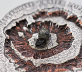 Серебряная арт-монета с осколком метеорита из кратера Попигай
