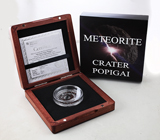Серебряная арт-монета с осколком метеорита из кратера Попигай