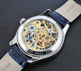 Приз за второе место — механические часы от Rousseau! 