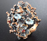 Серебряное кольцо с голубыми топазами и мозамбикскими гранатами Серебро 925