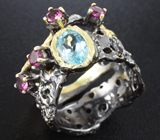 Серебряное кольцо с голубым топазом и родолитами Серебро 925