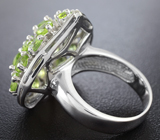 Эффектное серебряное кольцо с перидотами Серебро 925
