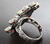 Серебряное кольцо с эфиопским опалом и гранатами