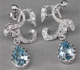 Изысканные серьги с голубыми топазами Серебро 925