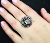 Серебряное кольцо с голубым топазом, танзанитами и разноцветными турмалинами Серебро 925