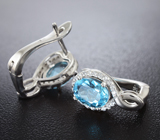 Прелестные серебряные серьги с голубыми топазами Серебро 925