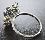 Серебряное кольцо с звездчатым сапфиром и цаворитами  Серебро 925