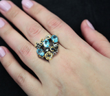 Серебряное кольцо с голубыми топазами и синими сапфирами Серебро 925
