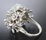 Кольцо c бесцветным топазом, танзанитами и бриллиантами