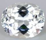 Кольцо c бесцветным топазом, танзанитами и бриллиантами