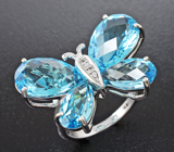 Чудесное серебряное кольцо с голубыми и бесцветными топазами Серебро 925