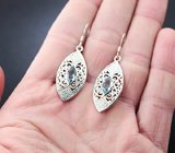 Крупные ажурные серебряные серьги с голубыми топазами