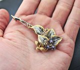 Серебряная брошь со звездчатыми сапфирами, родолитами и перидотом Серебро 925