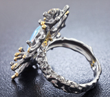 Серебряное кольцо с кристаллическим эфиопским опалом, синими сапфирами, цаворитами и родолитами Серебро 925