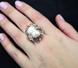 Серебряное кольцо с жемчужиной барокко, сапфирами, цаворитом и родолитом