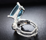Серебряное кольцо с голубым топазом авторской огранки и черными опалами Серебро 925