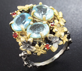 Серебряное кольцо с голубыми топазами и мозамбикскими гранатами Серебро 925