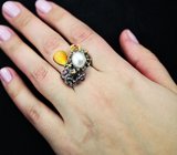 Серебряное кольцо с кристаллическим эфиопским опалом, жемчужиной, сапфирами и родолитами