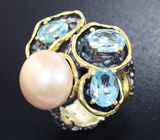 Серебряное кольцо с жемчужиной и голубыми топазам Серебро 925
