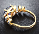 Золотое кольцо с танзанитом 2,81 карат и синими сапфирами Золото