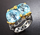 Серебряное кольцо с голубыми топазами и цаворитами Серебро 925