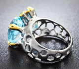 Серебряное кольцо с голубыми топазами и цаворитами Серебро 925