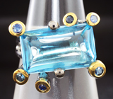 Серебряное кольцо c голубым топазом и синими сапфирами Серебро 925
