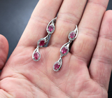 Изящные серебряные серьги с рубинами и бесцветными топазами Серебро 925