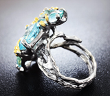 Серебряное кольцо с голубыми топазами и звездчатыми сапфирами Серебро 925