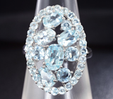 Изящное серебряное кольцо с голубыми топазами Серебро 925