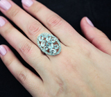 Изящное серебряное кольцо с голубыми топазами Серебро 925