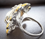 Серебряное кольцо с жемчужиной барокко и цаворитами