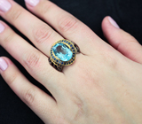 Серебряное кольцо с  голубым топазом и синими сапфирами Серебро 925