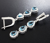 Элегантные серебряные серьги с голубыми топазами Серебро 925