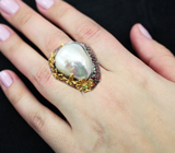 Серебряное кольцо с жемчужиной барокко, сапфирами и цаворитами Серебро 925