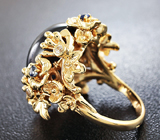 Кольцо со звездчатым сапфиром, а также синими и лейкосапфирами Золото