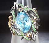Серебряное кольцо с голубым топазом, синими сапфирами и цаворитами Серебро 925