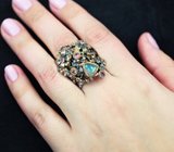 Серебряное кольцо с кристаллическим опалом, розовыми сапфирами и изумрудом Серебро 925
