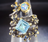 Серебряное кольцо с голубым топазом, кристаллическим эфиопским опалом и синими сапфирами Серебро 925