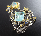 Серебряное кольцо с голубым топазом, кристаллическим эфиопским опалом и синими сапфирами Серебро 925