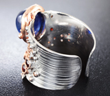 Серебряное кольцо с синим сапфиром и мозамбикскими гранатами Серебро 925