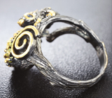 Серебряное кольцо с голубым топазом, перидотами и синими сапфирами Серебро 925