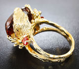 Золотое кольцо с крупным империал топазом 25,05 карат и сапфирами Золото