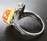 Серебряное кольцо со спессартином и родолитами гранатами