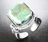Кольцо с муассанитом эксклюзивного размера, бриллиантами, голубыми и бесцветными сапфирами Золото