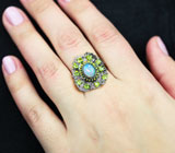 Серебряное кольцо с кристаллическим эфиопским опалом и перидотами Серебро 925