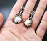 Серебряные серьги с жемчугом барокко и синими сапфирами Серебро 925