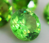 Набор из 4 уральских демантоидов 0,88 карат 