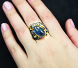 Серебряное кольцо с крупным синим сапфиром и перидотами Серебро 925